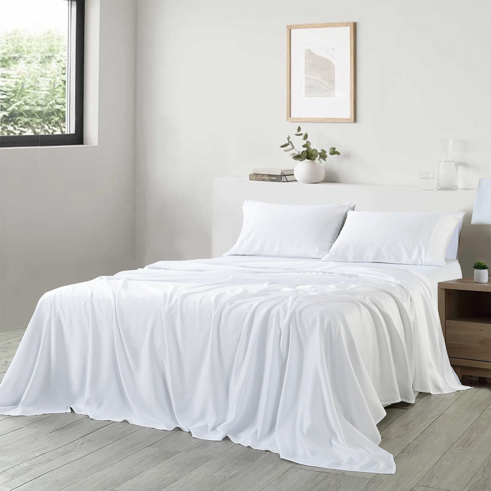 Royal Comfort 600 Thread Count Cooling Ultra Soft Tencel Eucalyptus sheet set featuring a flat sheet, fitted sheet, and pillowcases in a luxurious design.
